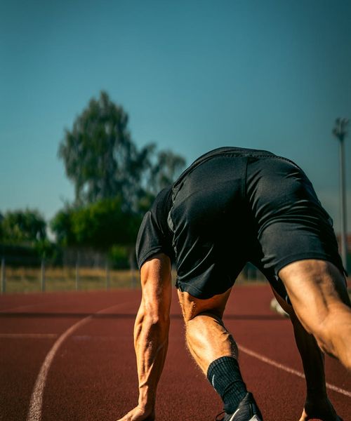 Man starting his day with active movements indoors